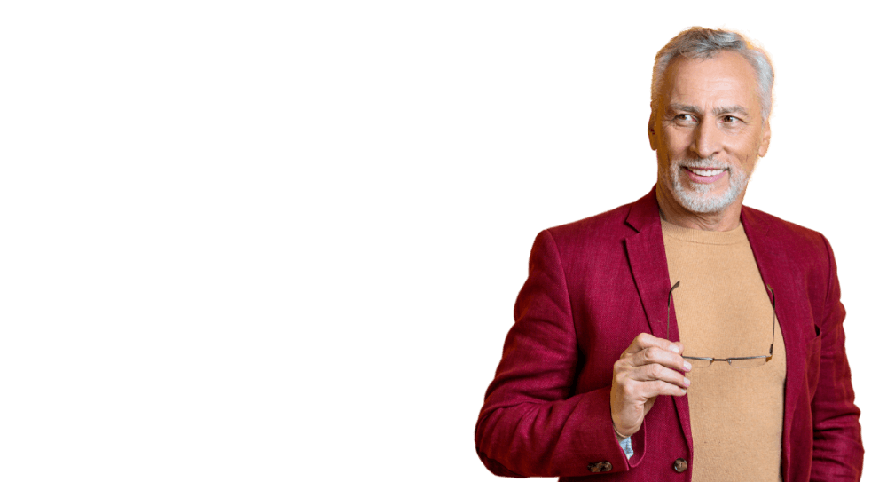 Group of smiling senior people that are all candidates for an implant-supported denture.